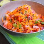 Grated carrot , tomato, onion salad with chia seeds