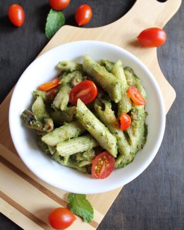 Pesto pasta with mushrooms and cherry tomatoes