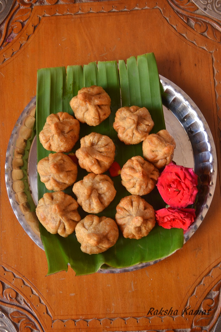 modak, Deep fried modak, Indian dumpling with grated coconut and jaggery