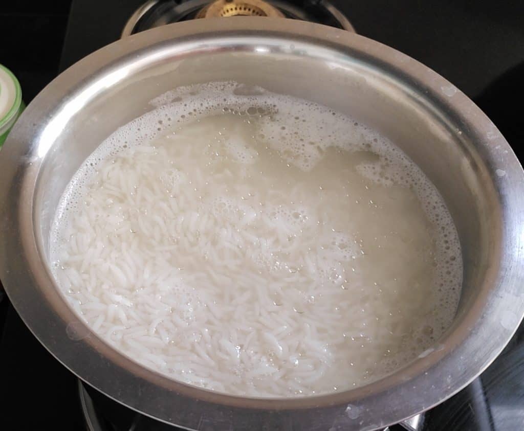 Boil water and add rice