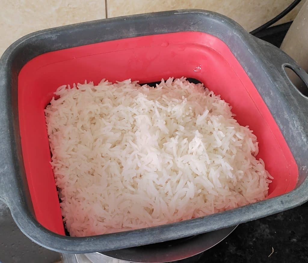 Drain the rice and let it dry in a colander or on a plate.